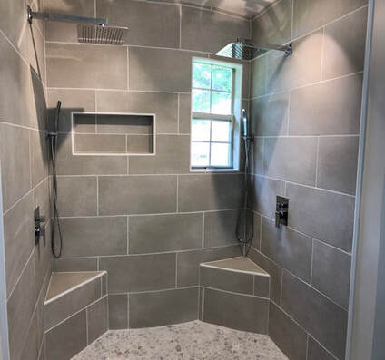 Gray Tile Shower with Double Shower Heads